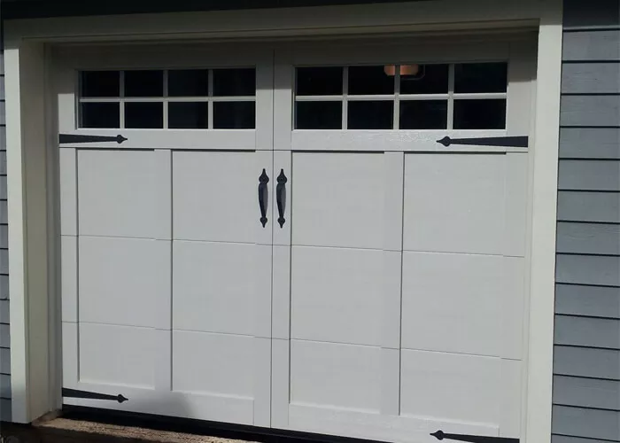 Eastman E-12, 9' x 7', Ice White door and overlays, 8 lite Panoramic windows 