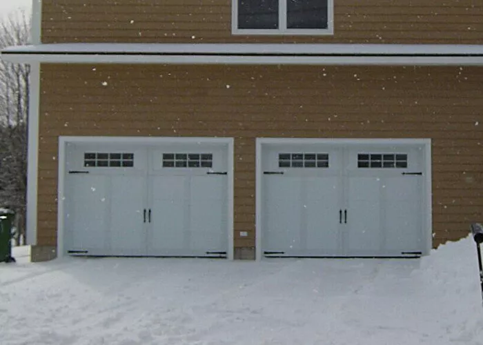 Eastman E-12, 9' x 7', Ice White doors and overlays, 8 lite Orion windows,