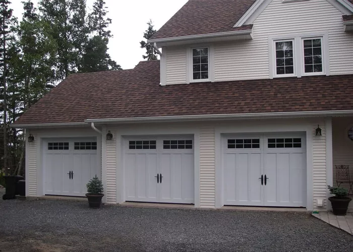 Eastman E-13, 9' x 7', Ice White doors and overlays, 8 lite Orion windows